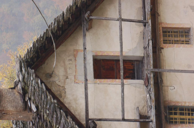 Ein gemaltes Bild eines Gebäudes mit Treppe und Fenstern.