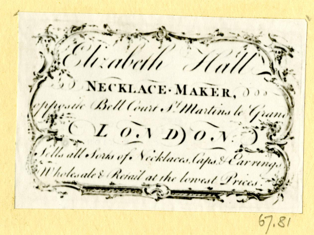 Ein altes Geschäftsblatt mit einem Bild eines Schmuckherstellers und Text, der seine Dienstleistungen beschreibt.