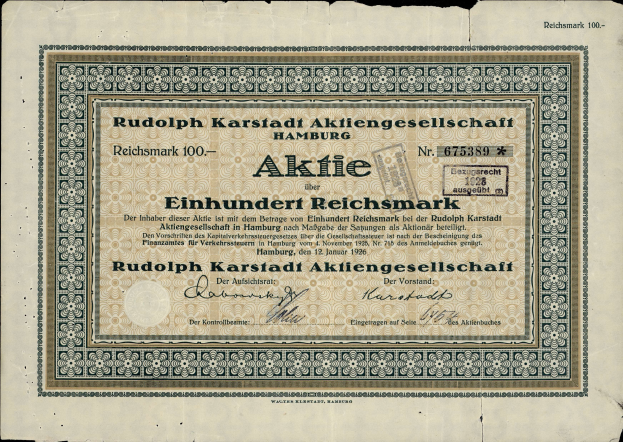 Ein altes deutsches Banknoten mit schwarzem Hintergrund und der Aufschrift "Rudolph Karlstadt Aktiengesellschaft Hamburg" darauf.