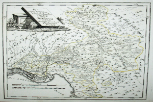 Ein altes Deutschland-Karte in einem Foto-Rahmen, mit einem Haus in der Mitte, umgeben von Straßen, Städten und geografischen Merkmalen.