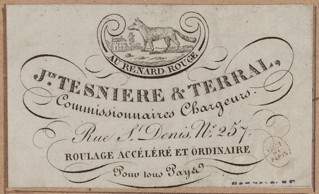 Alte Visitenkarte mit einem Hundebild in der Mitte und Text darauf.