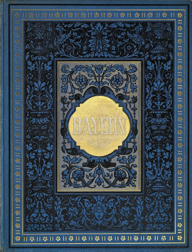 Ein blau-goldenes Buch mit der Aufschrift "Bayern" auf dem kunstvoll gestalteten Einband.