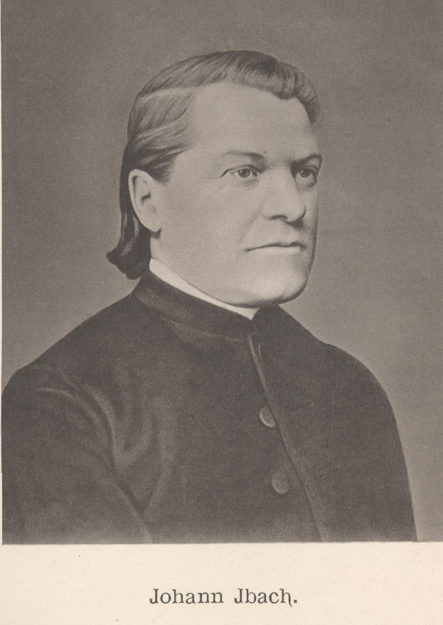 Ein Schwarz-Weiß-Foto von Johann Jbach, einem deutschen Komponist, der ein schwarzes Kleid trägt, mit Text unten im Bild.